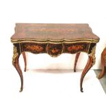 French Tulipwood and Marquetry Foldover Games Table, mid-19thC, the folding top enclosing a blue