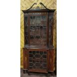 Fine mid-19th Mahogany Display Cabinet, a swan neck pediment over a floral inlaid border, breakfront