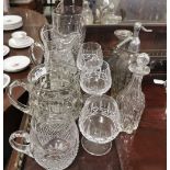 10 Cut Crystal Items - 3 Jugs, 3 brandy glasses, 1 tankard, 2 decanters, 1 Soda Syphon, some