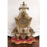 19thC Mantle Clock, in an Alabaster Case, the dial mounted with brass roman lettering and stamped “