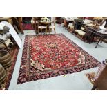 Fine woven Iranian bespoke design Rug, all over floral design, washed red ground (near pink), with