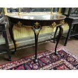 A George III style mahogany demi-lune Side Table with carved & parcel gilded decoration, Queen