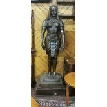 Tall Bronze Model of an Egyptian Woman wearing traditional regalia/head-dress, on a stepped base,
