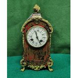 Early 20thC French Mantle Clock, with small gilt floral basket over a red tortoiseshell style case,