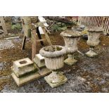 Pair of concrete classic design Garden Urns on bases & a similar garden urn, each about 0.70m High