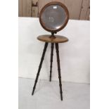 Georgian mahogany Gent’s Wash Stand, a pivoting mirror over a round shelf, on 3 bamboo style legs,