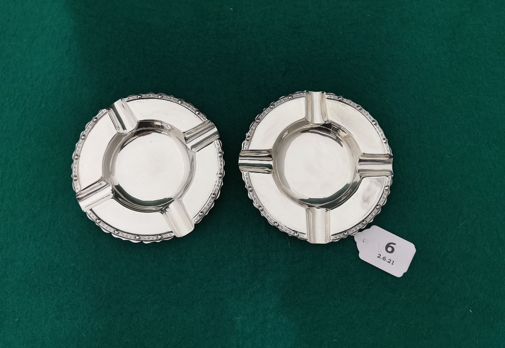 A matching pair of Irish Silver Ashtrays, Celtic design borders, Dublin 1966 by B Moynihan Ltd. 12cm