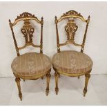 Pair of French Gilt Salon Chairs, with floral fabric, reeded front legs