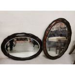 2 x 1950’s oval shaped wall mirrors with simulated frames, each 88cmW x 66cmH