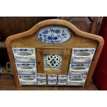 Large Wall Hanging Spice Rack – an arrangement of blue and white semi-porcelain drawers, in an oak