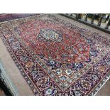 Red ground Kashan Carpet, fine woven city carpet, traditional medallion design, 3.45m x 2.30m