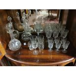 2 Shelves of Cut Glass Ware, including 4 sets of 6 wine glasses (1 etched), 3 decanters