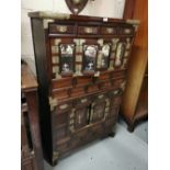 Early 20thC Japanese Cabinet, with 8 small drawers and bi-folding upper glass plated doors, over a