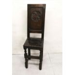 Antique Oak Child’s “Correction”, Chair, with phoenix moudling to the back, leather covered seat,