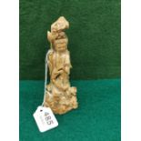 Carved figure of an Asian woman carrying a wreath, décor to the base 17mH x 6cmW