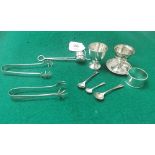 9 Pieces EPNS - two egg cups, a tea strainer, 3 salt spoons, 2 sugar tongs, 1 napkin ring (9)