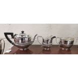 Three Piece Birmingham Silver Tea Set, hallmarked 1904, consisting of a Teapot (13cmW x 23cmH), a