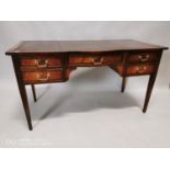 Early 20th C. mahogany kneehole desk.