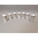 Collection of seven ceramic chemist jars.