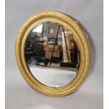 19th C. gilt and bevelled wall mirror.