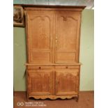 Early 19th C. bleached oak two piece food cupboard.