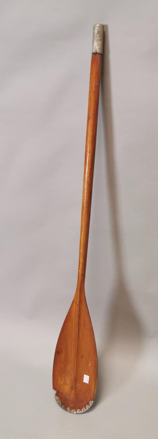 Wooden oar.