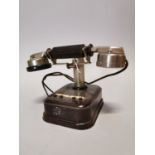 Early 20th. C. chrome and Bakelite telephone.