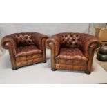 Pair of early 20th C. leather Chesterfield club chairs.