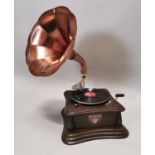 Mahogany gramophone with copper horn.