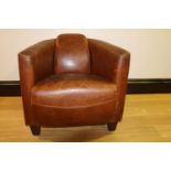 Good quality leather upholstered aviator style armchair.