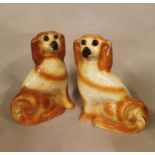 Pair of 19th C. Staffordshire dogs.