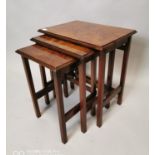 Edwardian walnut nest of tables.