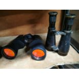 Two sets of binoculars.