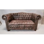 Leather Chesterfield two seater sofa.