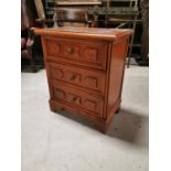 Mahogany three draw bedside cabinet.