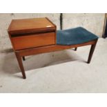 1970s teak and upholstered telephone seat.