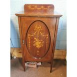 Edwardian inlaid mahogany music cabinet.