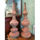 Pair of terracotta finials.