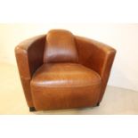 Aviator style leather upholstered tub chair.