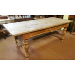 19th C. scrubbed pine kitchen table raised on turned legs {78 cm H x 210 cm W x 95 cm D}.