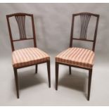 Pair of Edwardian inlaid mahogany side chairs.