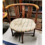 Edwardian inlaid mahogany open arm chair.