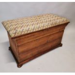 Early 20th C. pine and mahogany ottoman.