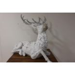 Resin model of a white stag.