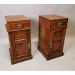 Pair of Edwardian walnut bedside lockers.