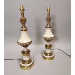 Pair of brass and painted table lamps.
