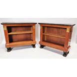 Pair of 19th C. mahogany bookcases with marble tops.