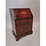 19th C. mahogany and satinwood miniature bureau.