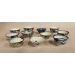 Oriental blue and white ceramic Saki cups.