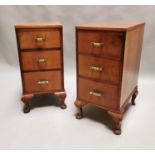 Pair of walnut Art Deco bedside lockers.